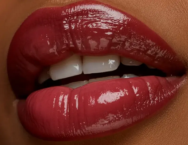 The biggest mistake with dark burgundy lipstick on brown skin (glossy finish fix)