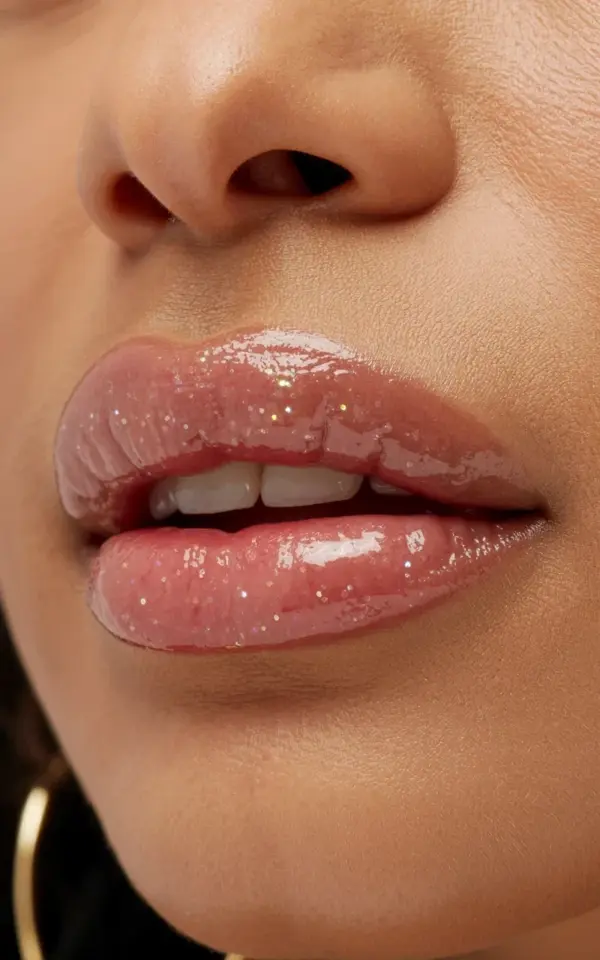 Glossy Nude Pink Lipstick Shade with Luminous Sparkle for Spring