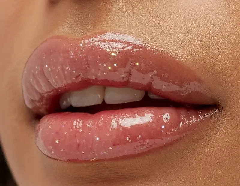 Glossy Nude Pink Lipstick Shade with Luminous Sparkle for Spring
